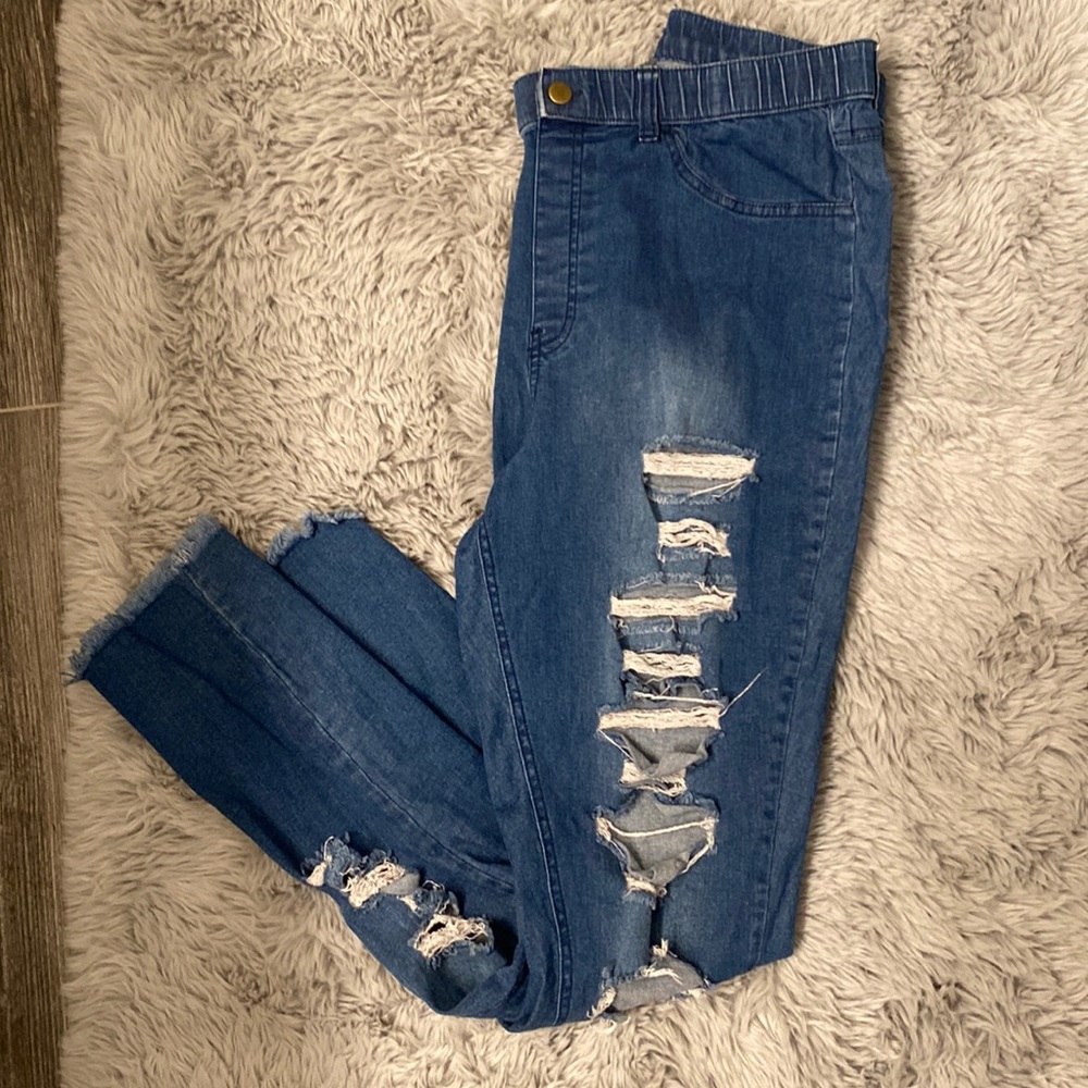 Distressed pull on jean pants